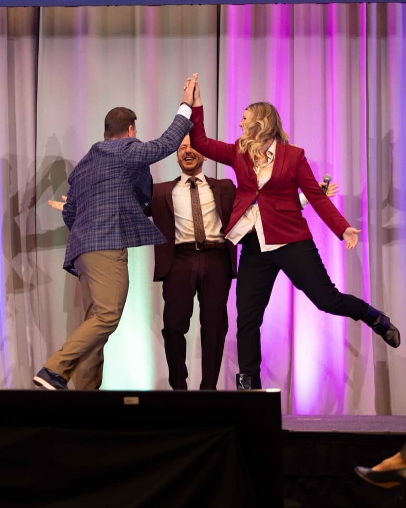 Event guests celebrating during a mentalism performance